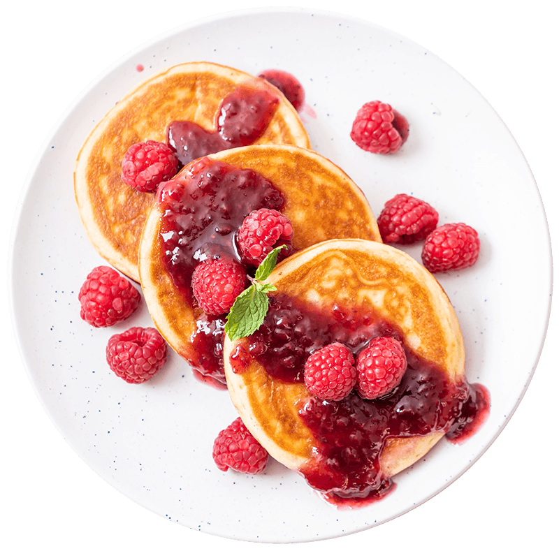 Pancakes with raspberries and fruit sauce